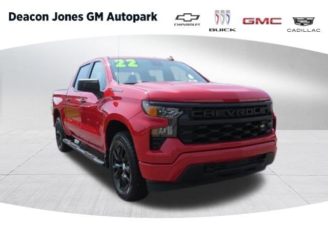 2022 Chevrolet Silverado 1500 Custom in Red Hot — front three-quarter view