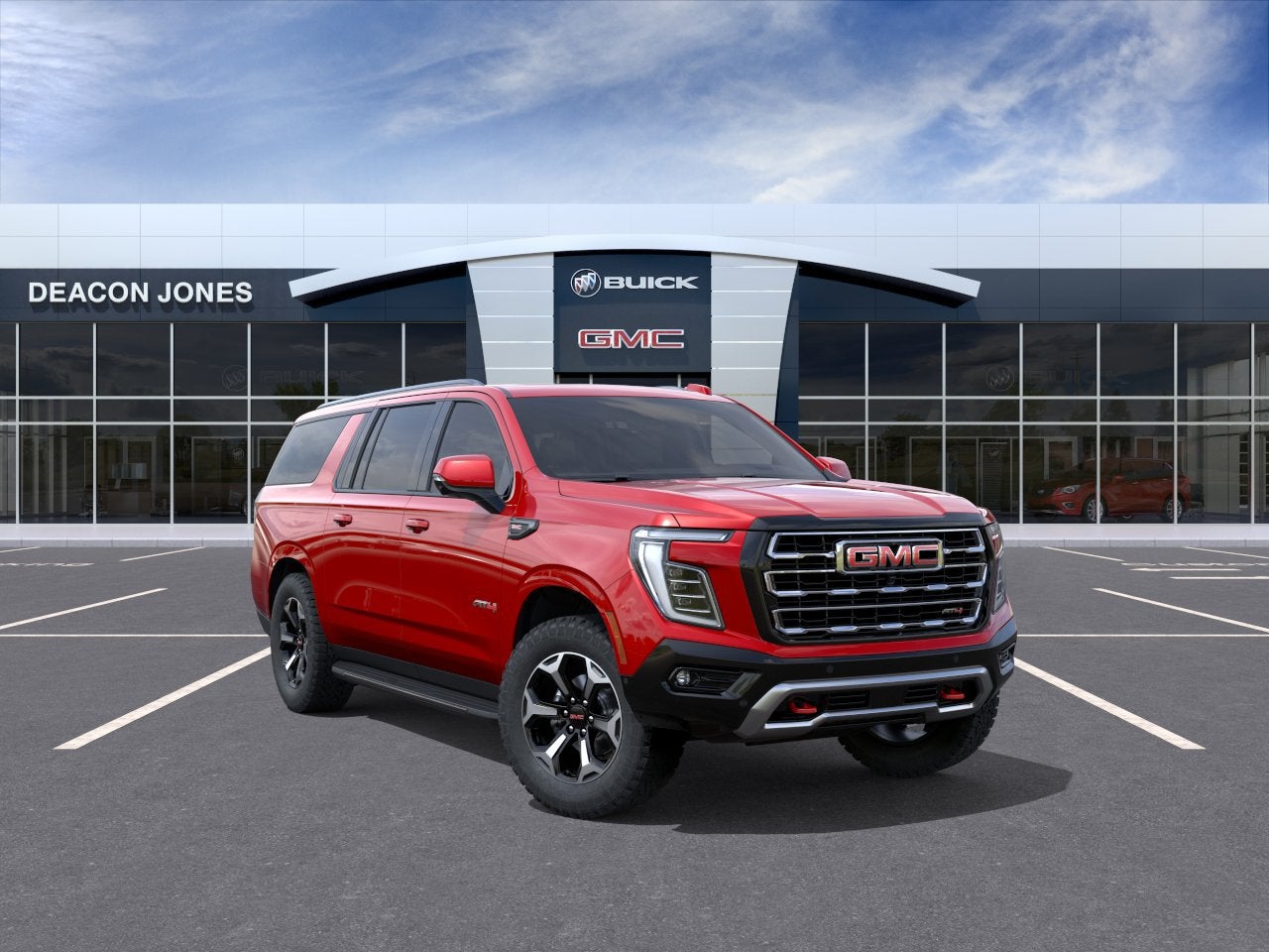 2026 GMC Yukon XL AT4 in Volcanic Red Tintcoat — front three-quarter view